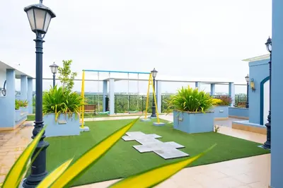a playground on the roof of a building at 2BHK with Pool and Rooftop at the Centre of Kozhikode in Kozhikode