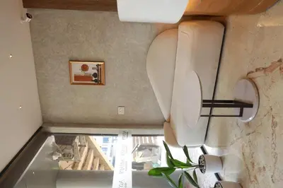 an overhead view of a bathroom with a toilet at Amani Residency Kannur in Kannur