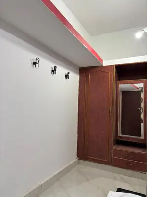 three black elephants on the wall of a room at Arranyaa retreatt- Girrafe's gallery in Mysore