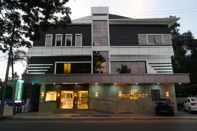 a building with a store in front of it at PANCHAVADY RESIDENCy in Kodungallūr