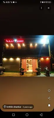 a model of a building at night with lights at Tamar padinjarathara in Padinjarathara