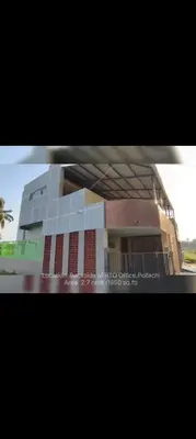 a picture of a building in front at R N P Guest House in Pollāchi
