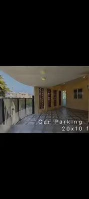 a picture of a house with the words cat painting at R N P Guest House in Pollāchi