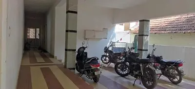 a group of motorcycles parked inside of a building at K square in Coimbatore