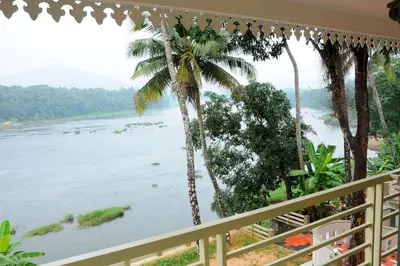 a view of the river from a balcony at SHANKARAM Homestay in Kodanad