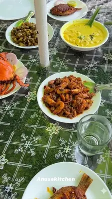 a table with many plates of food on it at Kakkakuni heritage in Kozhikode