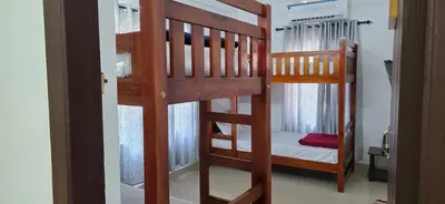 a couple of bunk beds in a room at Brighton Hostel Stays in Sultan Bathery