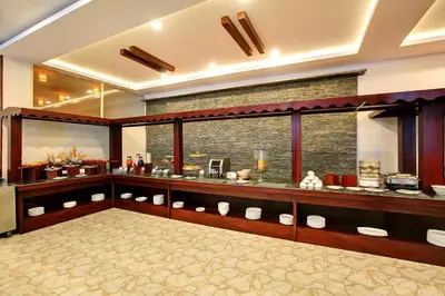 a room with aasteryasteryasteryasteryasteryasteryasteryasteryasteryasteryasteryastery at Gokulam Grand Resort & Spa, Coorg in Kushālnagar