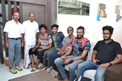 a group of men posing for a picture at Dream Land Residency in Mananthavady