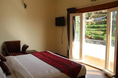 a bedroom with a bed and a large window at Golden Springs in Ooty