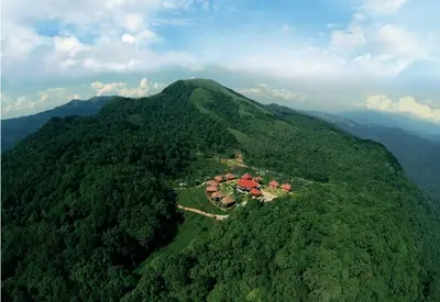 an aerial view of a house on top of a mountain at Wild Planet Jungle Resort in Devāla