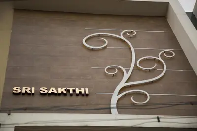 a sign that says sri saatchi on the floor at Hotel Sri Sakthi in Tiruppūr