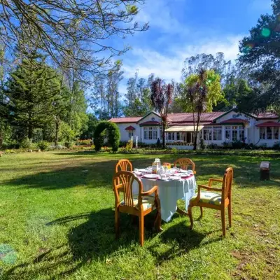 SaffronStays Milton Abbott Estate - 2BR colonial-era bungalow with garden