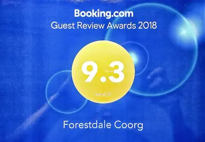 a sign that reads guest review awards at Forestdale Coorg in Virajpet