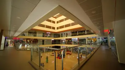 a view of a shopping mall from the second floor at Vavas Inn & Suites in Perintalmanna