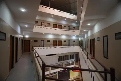 a view of a hallway in a building at Haksons Residency in Mananthavady