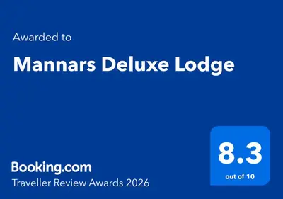 a screenshot of the manmas deliver lodge webpage at Mannars Deluxe Lodge in Mysore