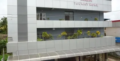 a building with plants on the side of it at SOUTH SIDE RESIDENCY By Chungath in Kizhake Chālakudi