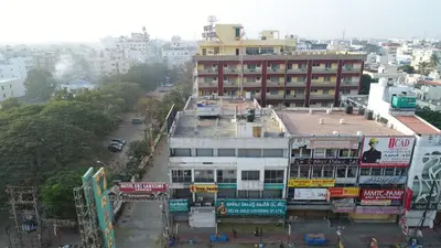 an overhead view of a city with a building at Hotel Srilakshmi in Coimbatore