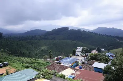 an aerial view of a village in the mountains at Sri Nandha Luxury Comforts in Vālpārai