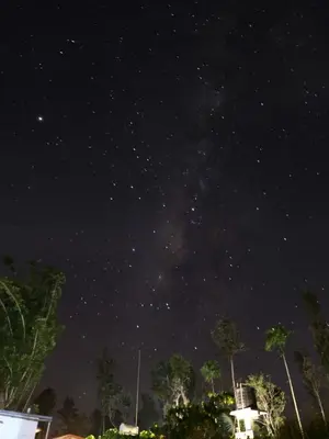a starry night with the milky way in the sky at Coorg Kolamotte in Gonikoppal