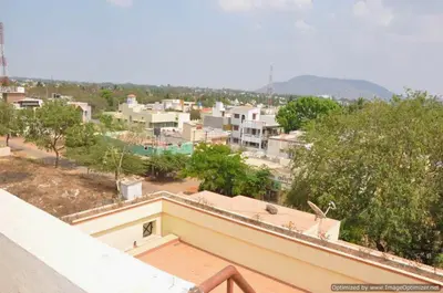 a view of a city from the roof of a building at Suvarna Luxury Home Stay in Mysore