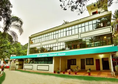 an office building with a sign that reads strength turned home at Surabhi Suites in Angamali
