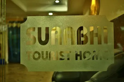 a sign that reads sun bill yourselfllorllor at Surabhi Suites in Angamali