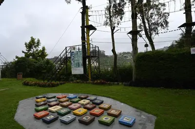 a group of different colored cell phones sitting on a table at Sterling Ooty Fern Hill in Ooty