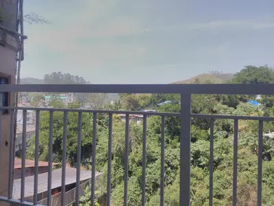 a view from the balcony of a house at Landy Queen in Munnar