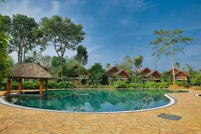 an image of a swimming pool at a resort at Morickap Resort in Vythiri