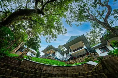 a view of a house from the stairs at Golden Fern Resort in Kanthalloor