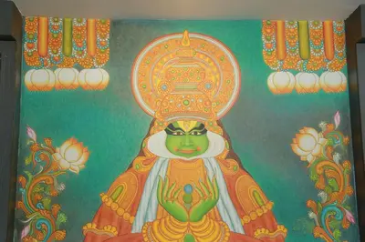a mural of a god in a room at Hotel Jyothis Regency in Palakkad