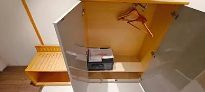a cabinet with a cash register in it at The Mayberry -A Bergamont Group of Hotels in Tiruppūr