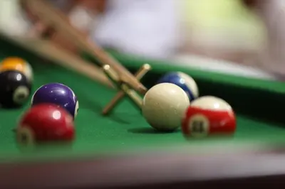 a group of billiard balls on a pool table at CONTOUR ISLAND RESORT & SPA , wayanad in Tariyod