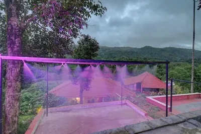 a skateboard ramp in front of a pink house at Coorg Heritage Hill View By The Avyaan in Madikeri