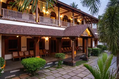 an image of a resort with tables and chairs at Villa De 1945 in Mahe