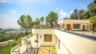 a view from the roof of a house at Aira Residency Kothagiri by Lexstays in Kotagiri