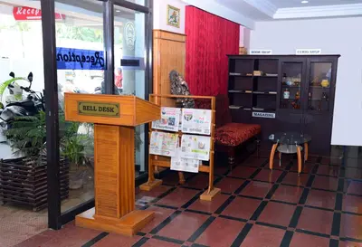 a store with a sign that says call back at Hotel Kairali in Palakkad