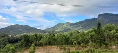 a view of a valley with mountains in the background at Aden Valley in Kanthalloor