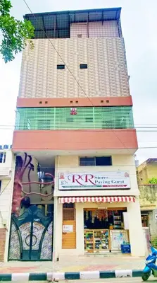 a building with a krispy kremeasteryasteryasteryasteryasteryasteryastery at RR Paying Guest in Mysore