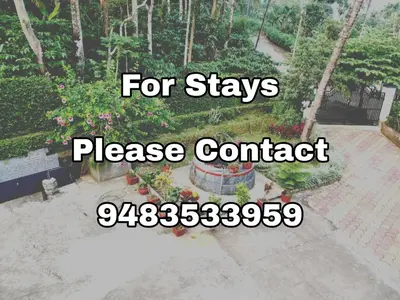 a sign that reads for stays please contact at Aiyappa Stays in Madikeri