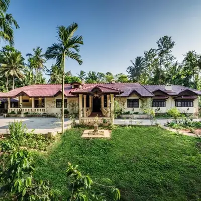SaffronStays Calamondinn Bungalow - 5BR Colonial Heritage Home within Coffee Plantation in Coorg