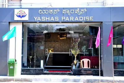 a store front with a sign that reads ystals paradise at Yashas Paradise in Nanjangūd