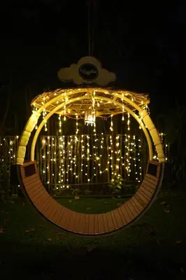 a circle of lights in a yard at night at Kayyalas Courtyard in Trichūr