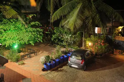 a car parked next to a bunch of plants at Aldora Holiday Homes in Vythiri