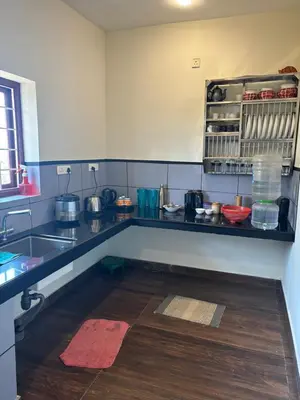 a kitchen with a sink and a counter top at Casa Felicia-Adding happy moments to your diary in Ooty