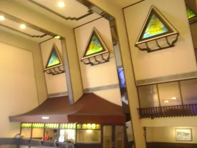 a church with stained glass windows on the wall at Manuelsons Malabar Palace in Kozhikode