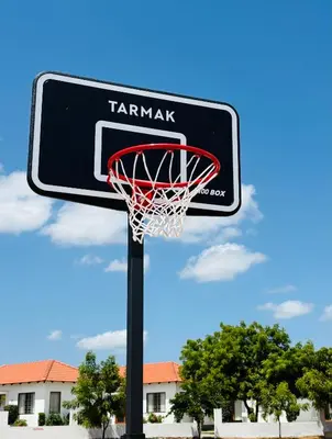 a basketball hoop with a sign on it at MALLI resort in Dhārāpuram