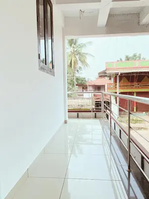 a view from the balcony of a house at THEKKUMPURAM RESIDENCY in Kondotti